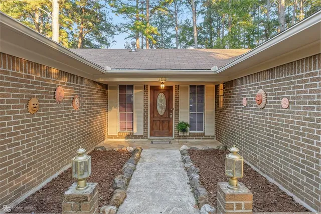 a front view of a house with a porch