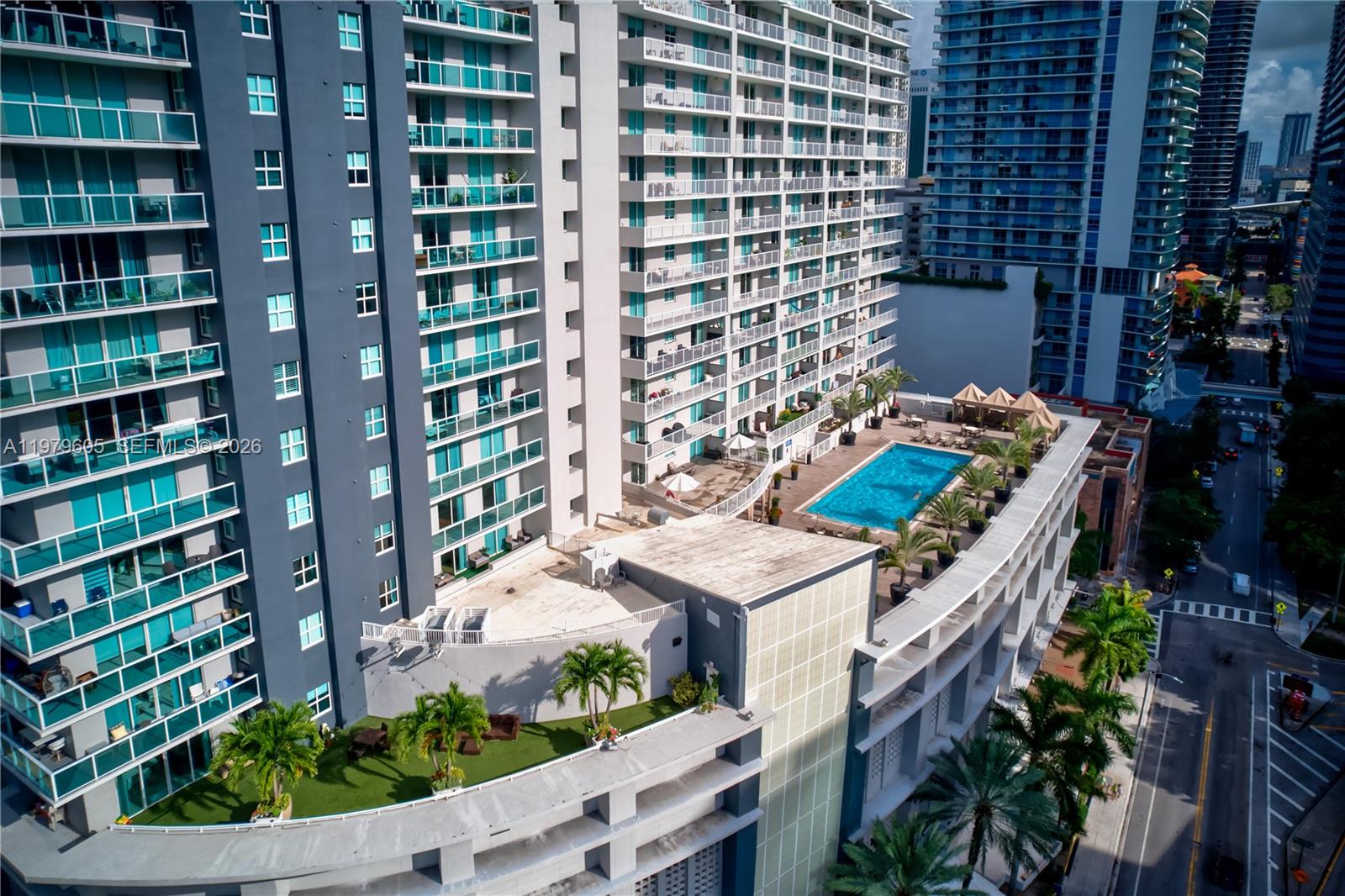 1250 South Miami Avenue, Unit 2802 Miami, FL 33130 - Photo 21 of 64 a view of a house with a yard and potted plants
