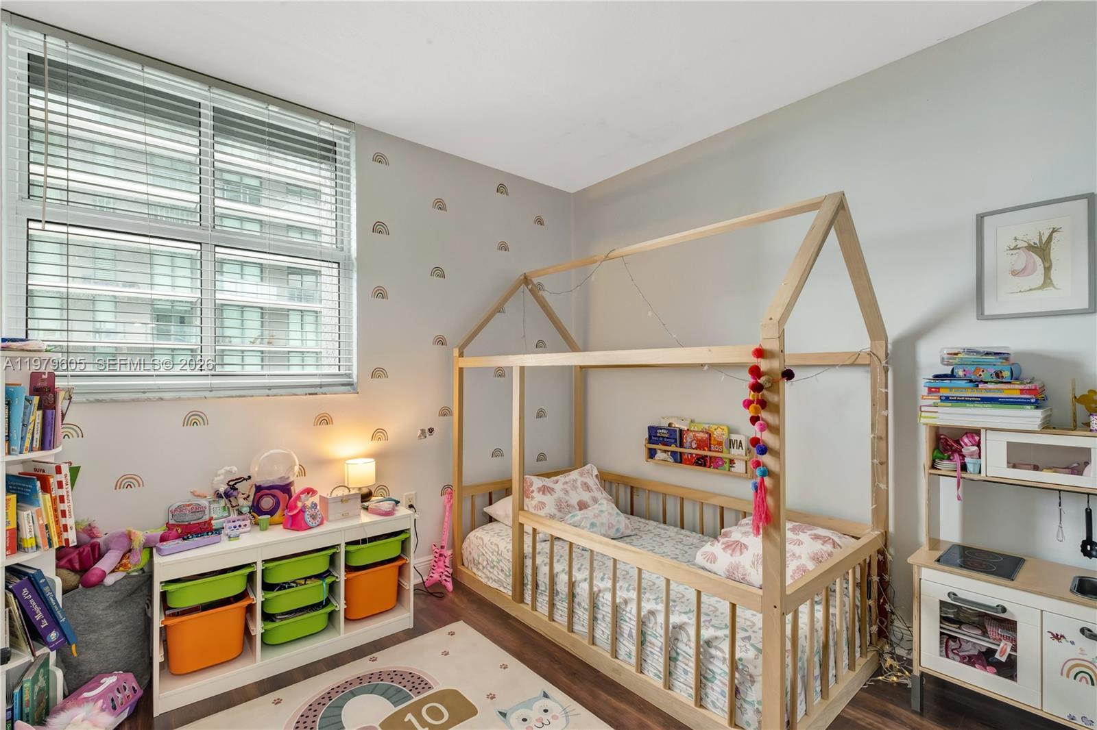 1250 South Miami Avenue, Unit 2802 Miami, FL 33130 - Photo 52 of 64 a bedroom with baby crib and a window