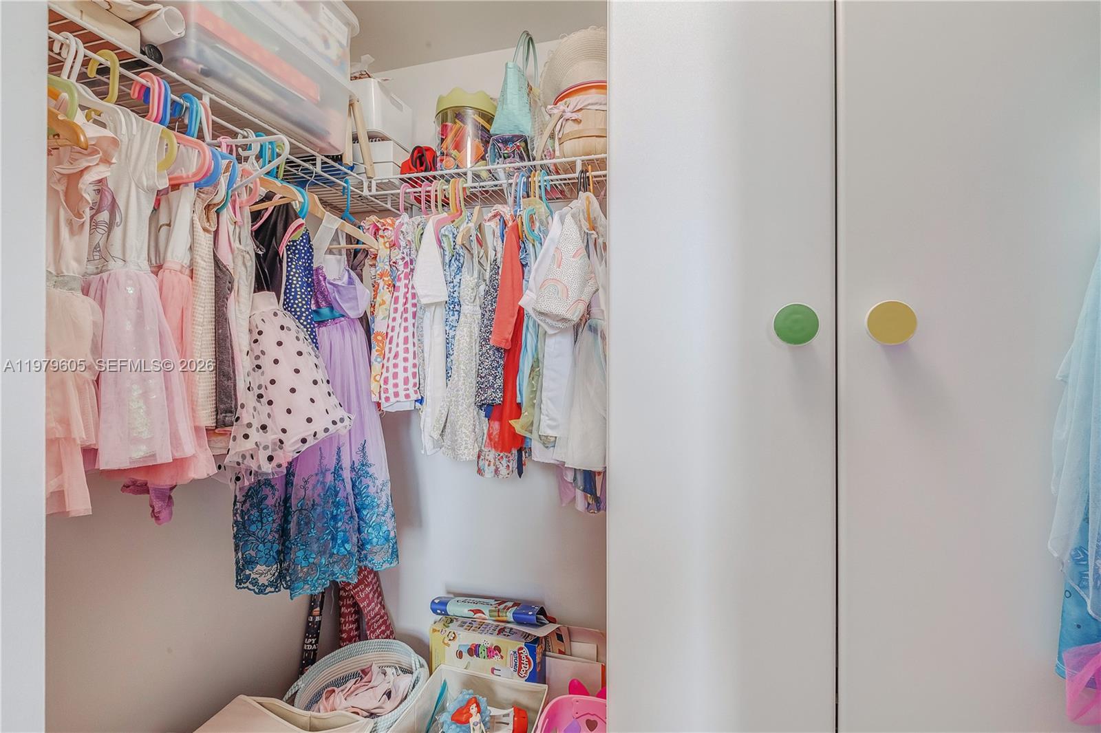 1250 South Miami Avenue, Unit 2802 Miami, FL 33130 - Photo 55 of 64 a view of walk in closet with clothes and shoes