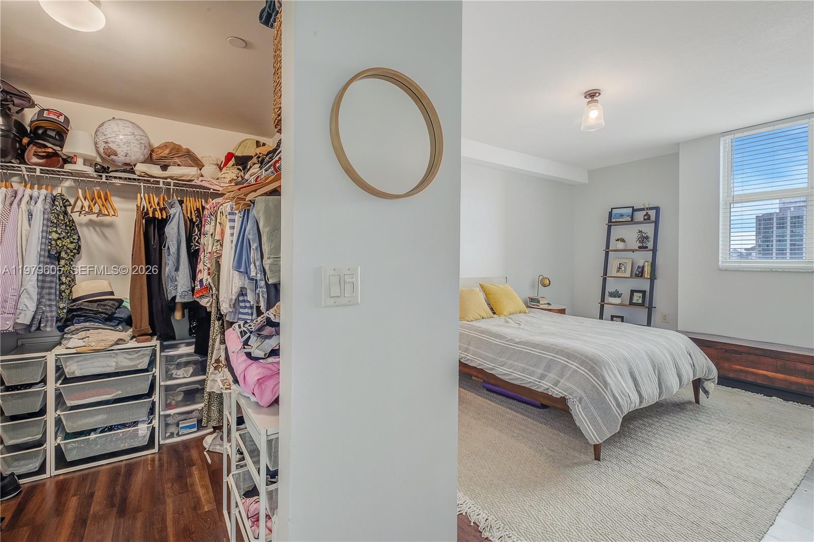 1250 South Miami Avenue, Unit 2802 Miami, FL 33130 - Photo 63 of 64 a bedroom with a bed and a closet