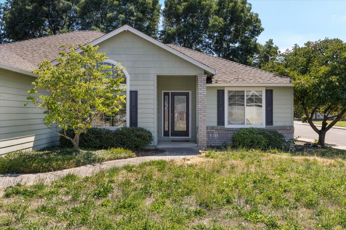 2308 Rabun Way Central Point, OR 97502 - Photo 2 of 26 a view of a house with yard and plants