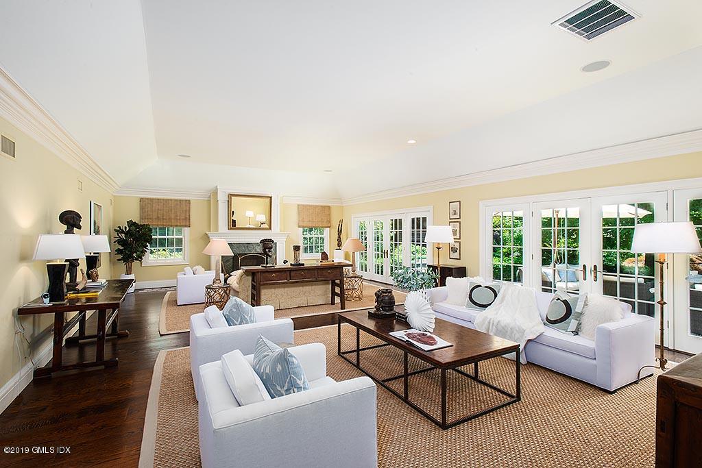 62 Sumner Road Greenwich, CT 06831 - Photo 3 of 25 a living room with furniture and a large window