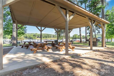 a view of a outdoor space with patio and wooden floor