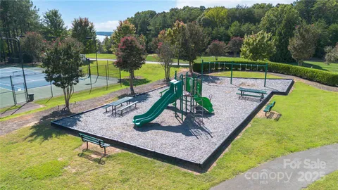 swimming pool with chairs