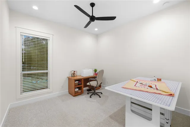 a room that has a bed and a window