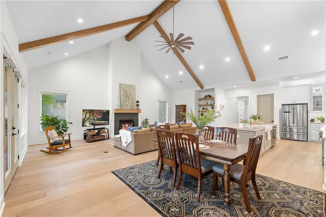 a view of a livingroom with furniture window and wooden floor