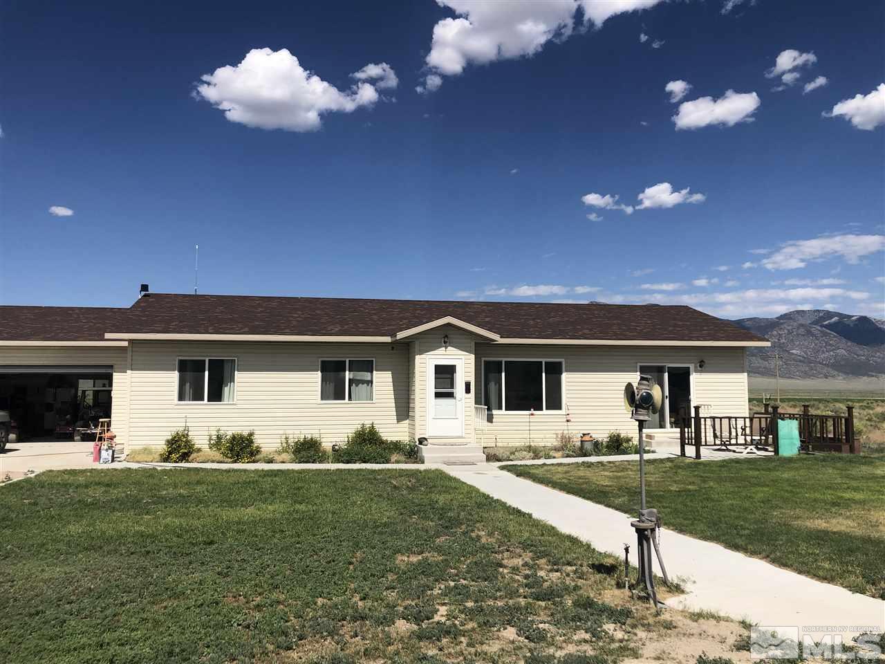 2640 Monte Neva Road Ely, NV 89301 - Photo 3 of 6 a front view of a house with a yard