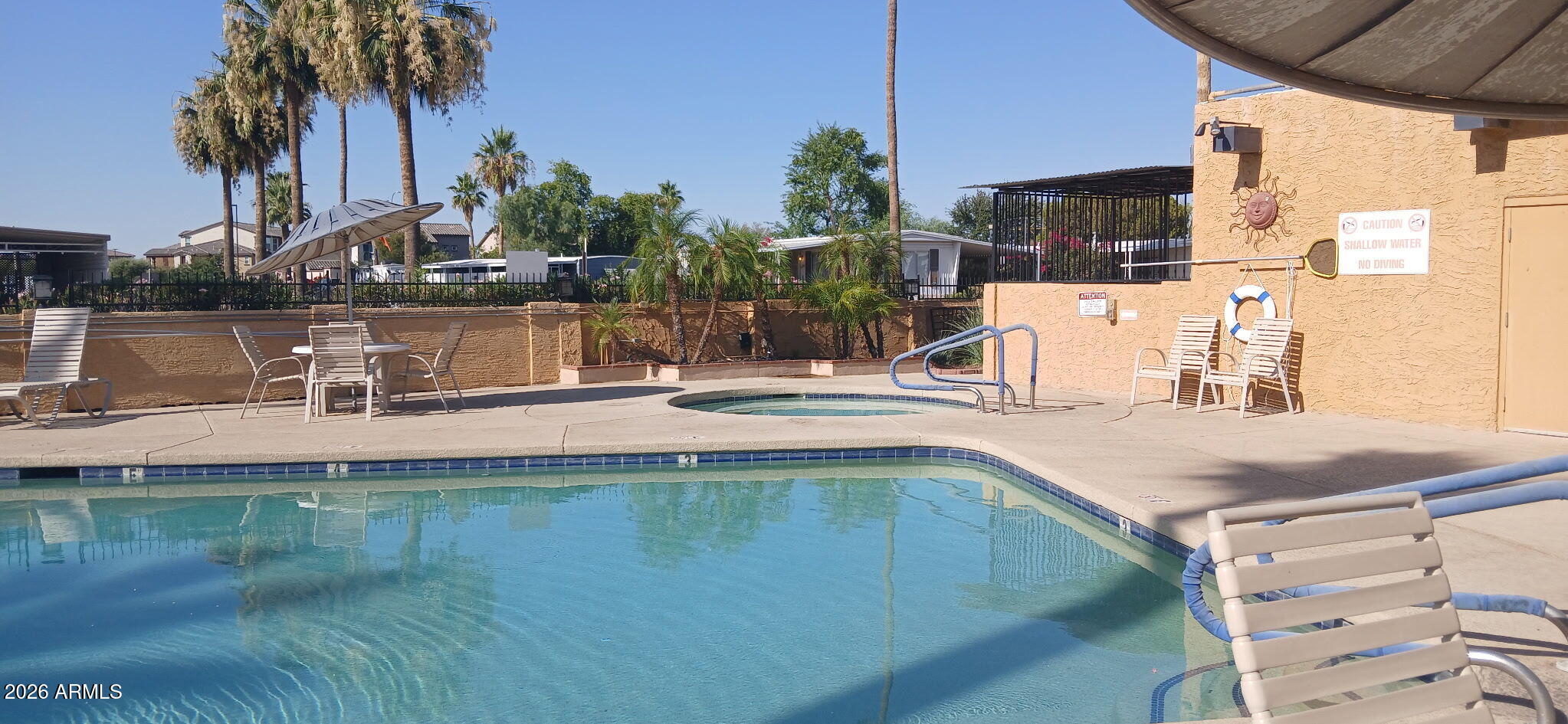 200 East Knox Road, Unit 91 Chandler, AZ 85225 - Photo 37 of 37 a view of a swimming pool with a patio