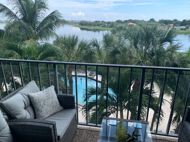 a balcony with chairs