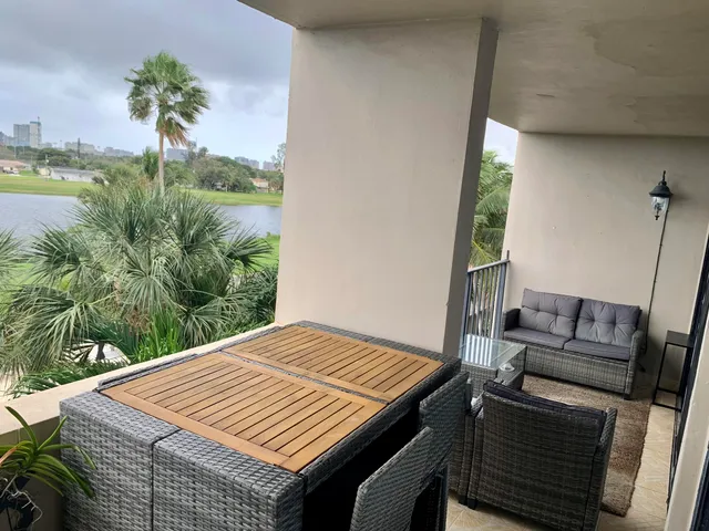 a view of a balcony with lake view