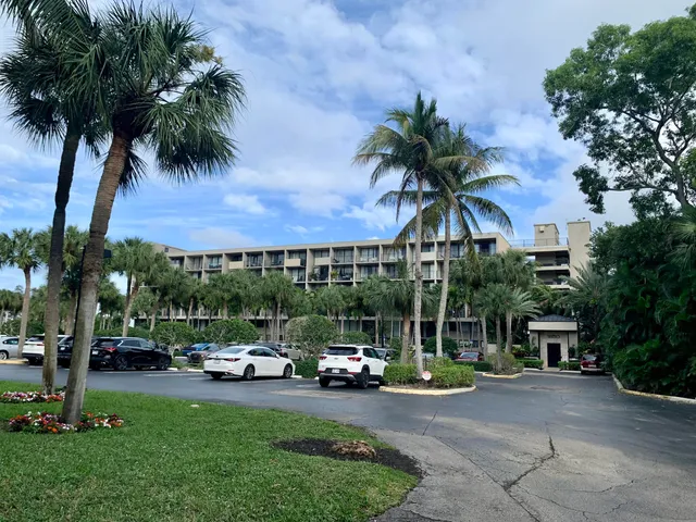 a view of a park with a car parked