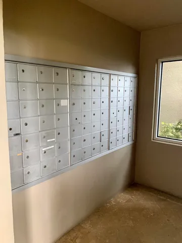 an aerial view of green landscape with lake view