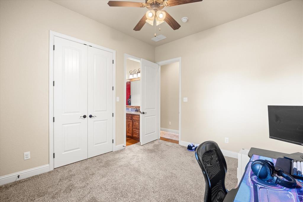 104 Rattling Antler Court Azle, TX 76020 - Photo 21 of 38 Two of three secondary bedrooms.