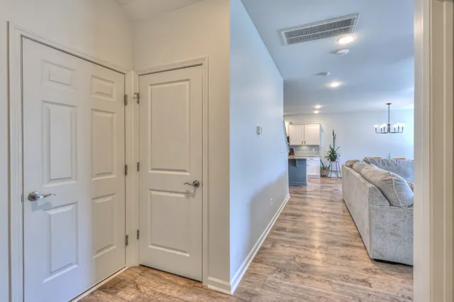 a view of a room with gym equipment and a window