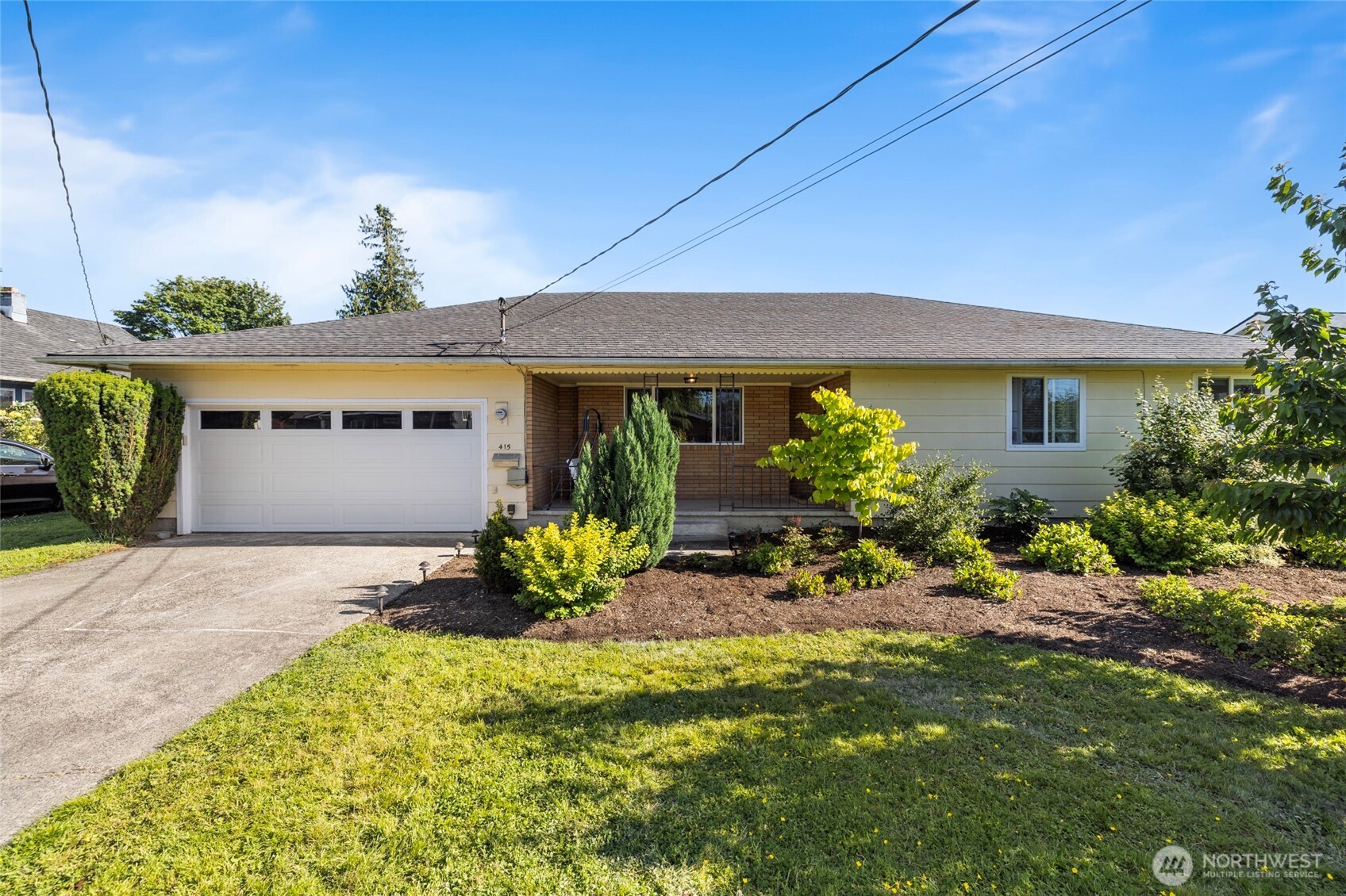 415 Sterling Street Sedro-Woolley, WA 98284 - Photo 1 of 38 a front view of a house with a yard