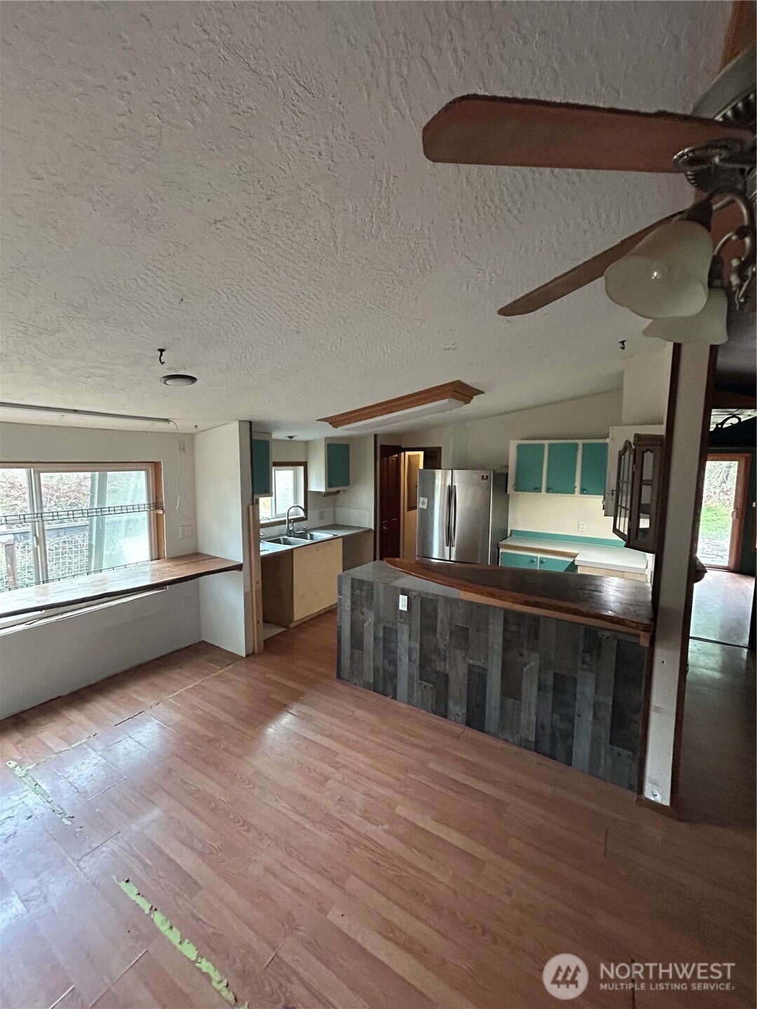 143 Berry Road Chehalis, WA 98532 - Photo 5 of 13 a view of a living room with furniture and window