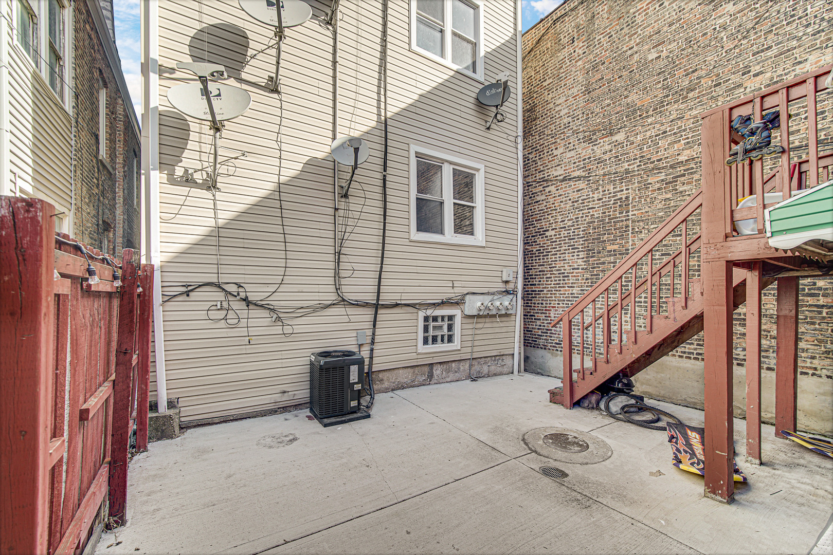 2623 West 21st Place Chicago, IL 60608 - Photo 28 of 29 a view of a house with stairs and wooden stairs