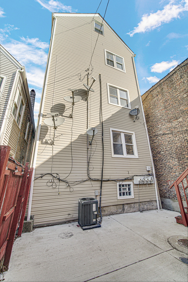 2623 West 21st Place Chicago, IL 60608 - Photo 29 of 29 a view of a large building with many windows