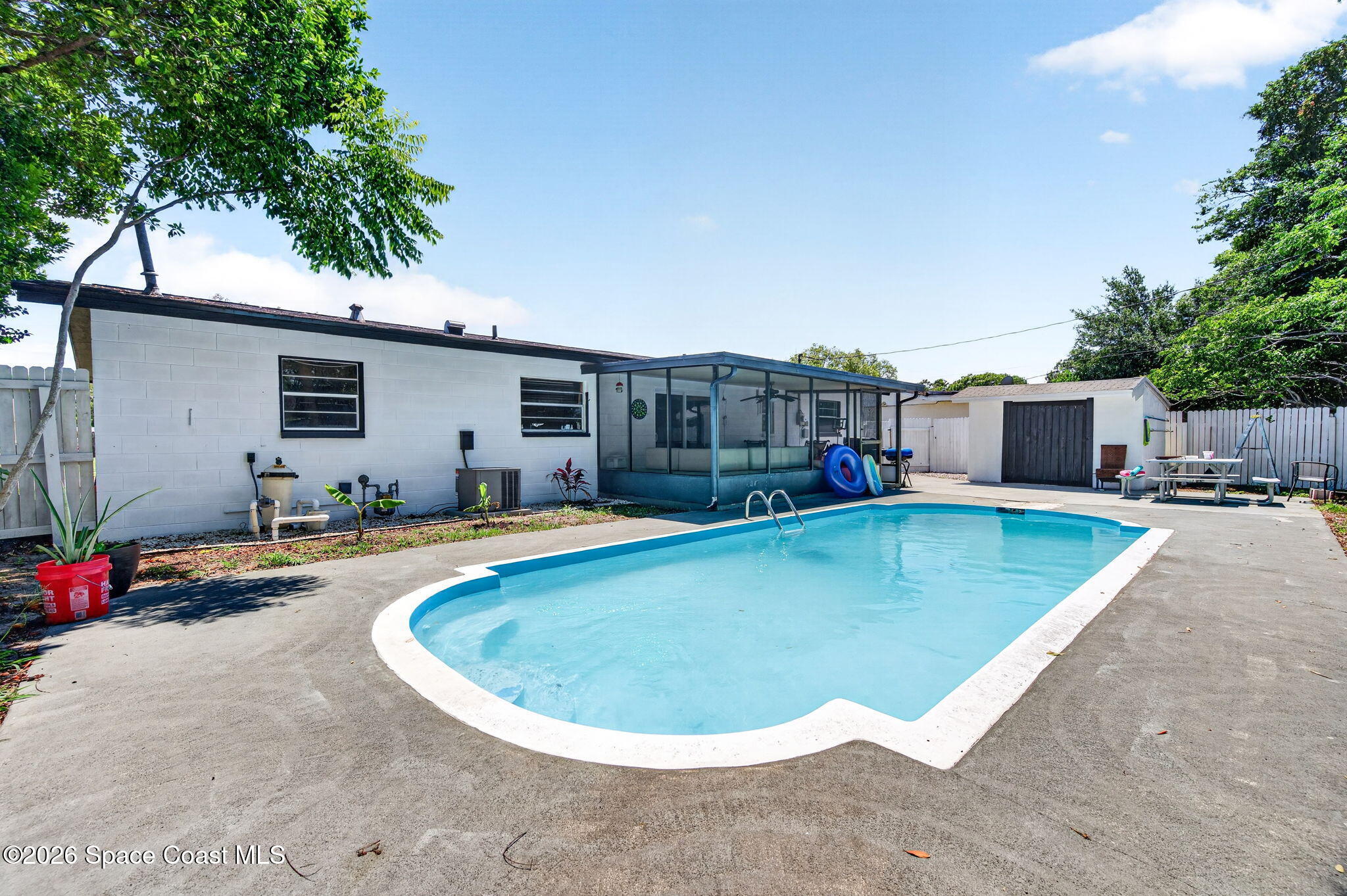 3300 Argyle Road Titusville, FL 32796 - Photo 24 of 29 a view of a house with swimming pool