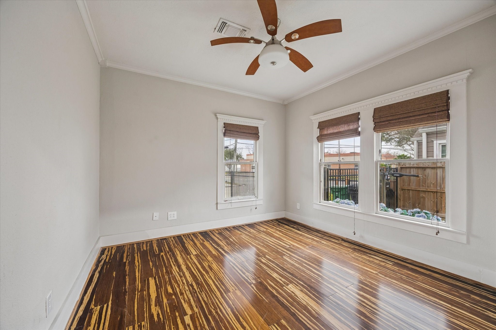 1124 Dunbar Street Houston, TX 77009 - Photo 12 of 21 Secondary bedroom at the front of the house with ample natural light