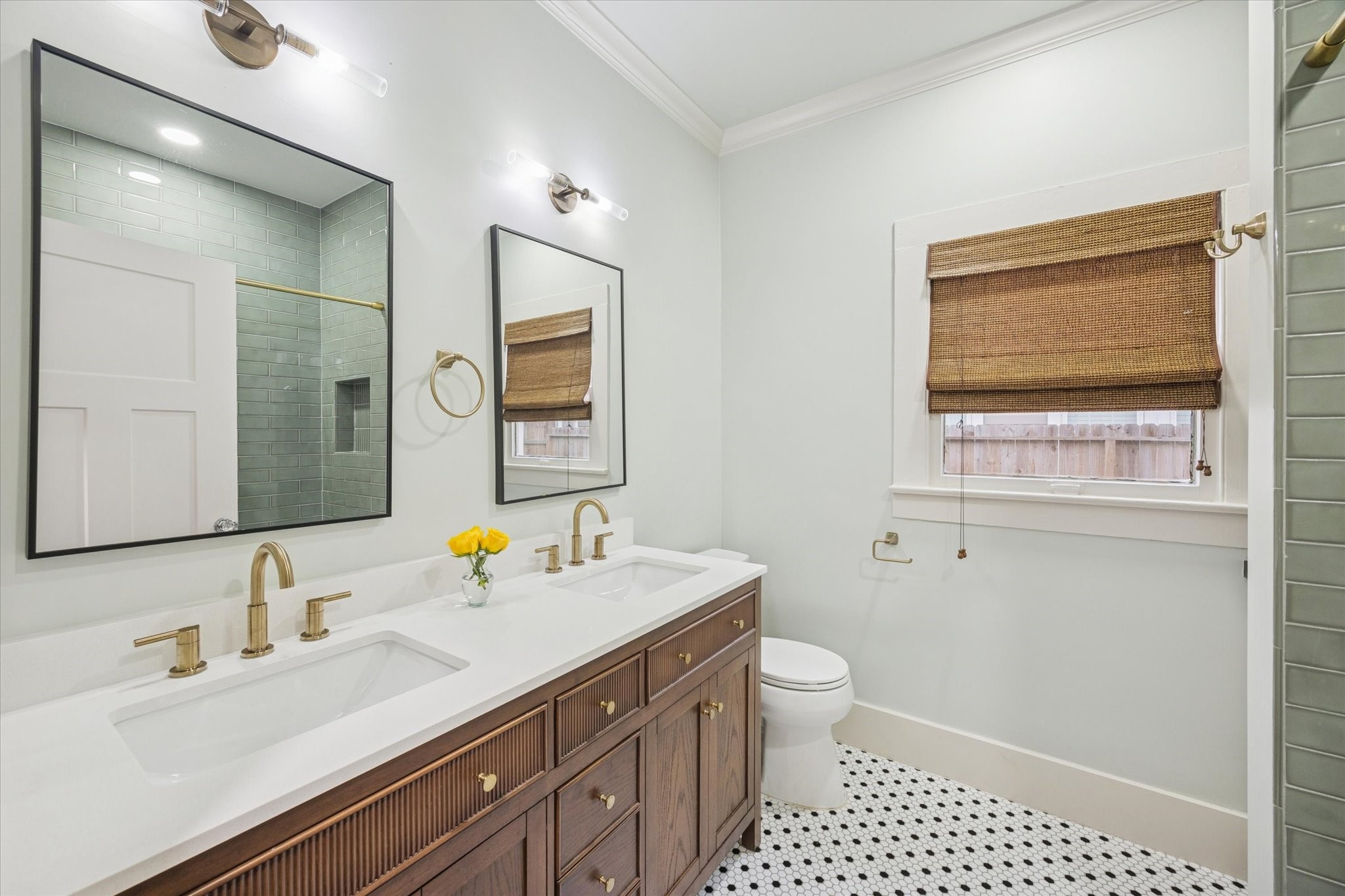 1124 Dunbar Street Houston, TX 77009 - Photo 13 of 21 Beautifully renovated bathroom with double sinks and large vanity