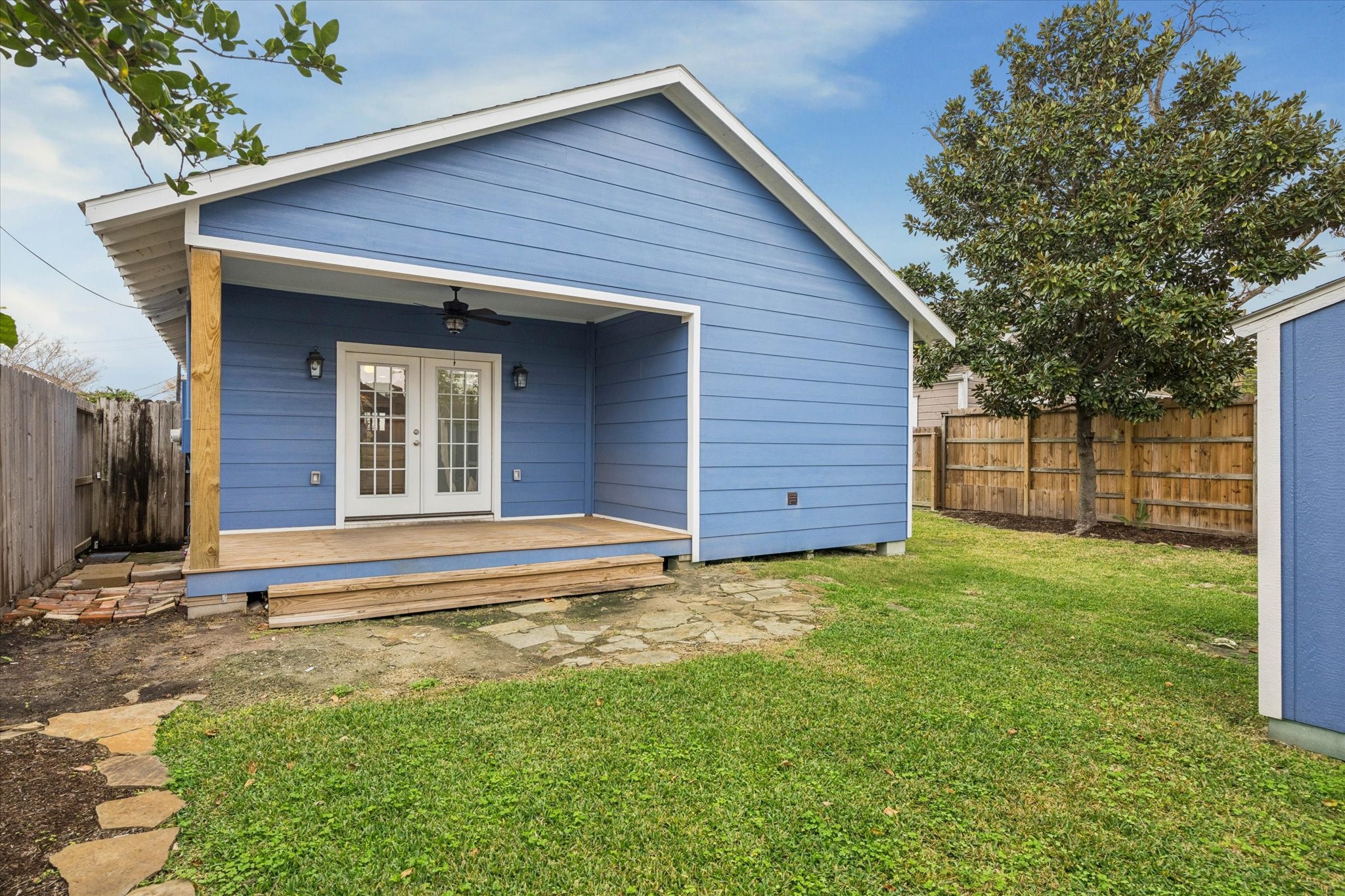 1124 Dunbar Street Houston, TX 77009 - Photo 20 of 21 An angle of the back of the home, showcasing the great porch and green space