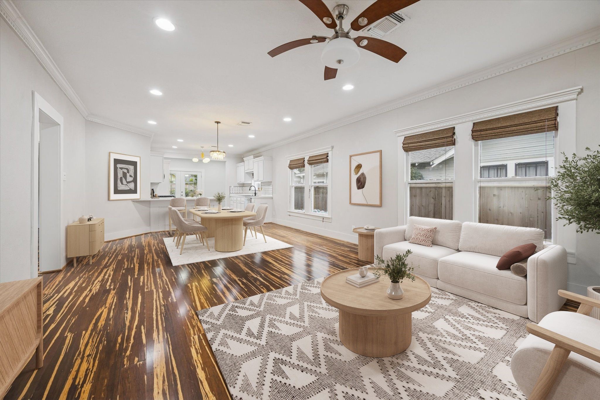 1124 Dunbar Street Houston, TX 77009 - Photo 4 of 21 Living/dining combo upon entry to the home. Light filled with high ceilings and hardwood floors *this photo is virtually staged*