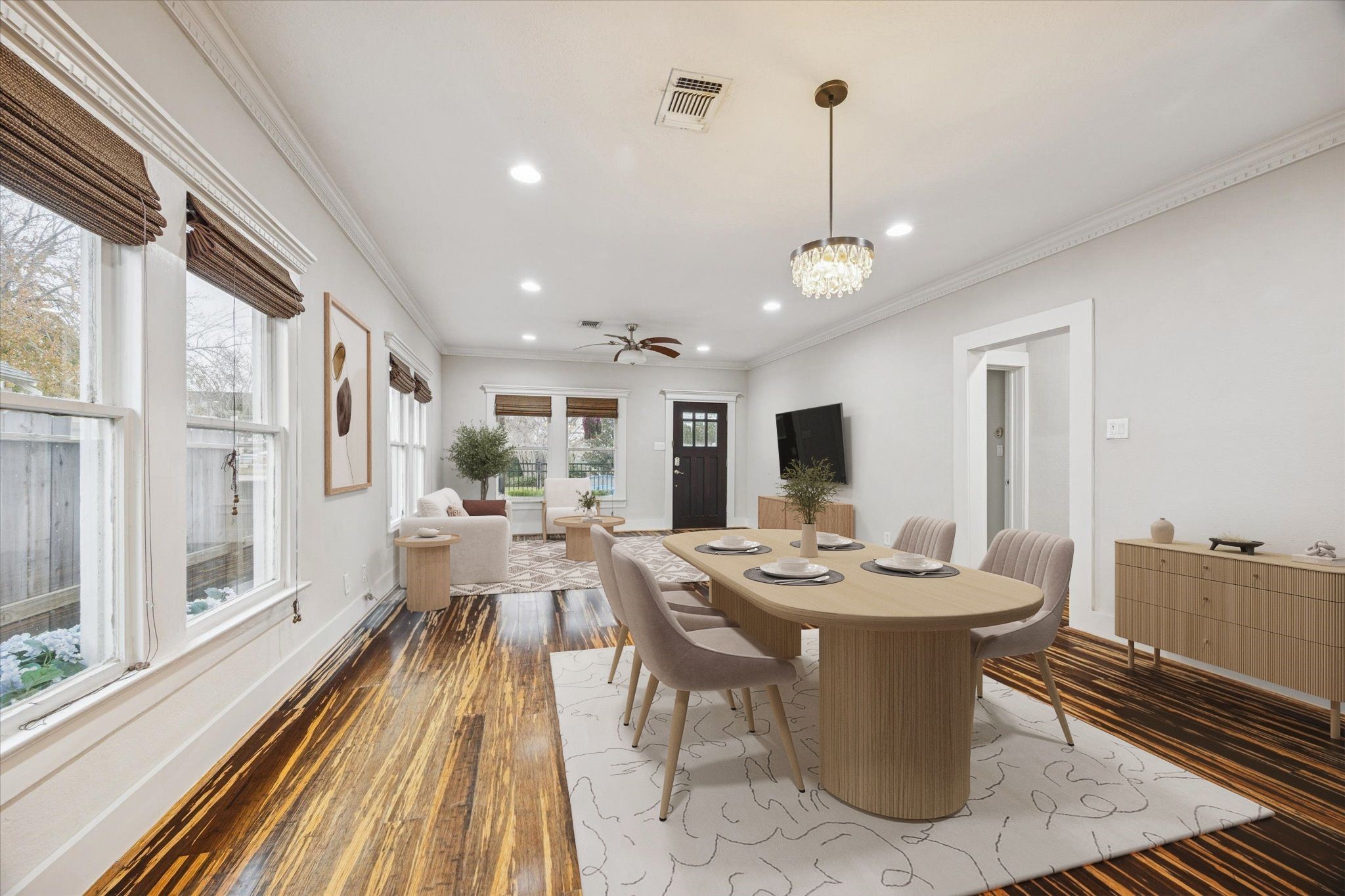 1124 Dunbar Street Houston, TX 77009 - Photo 21 of 21 Another angle of this space, showcasing the open floor plan and windows *this photo is virtually staged*