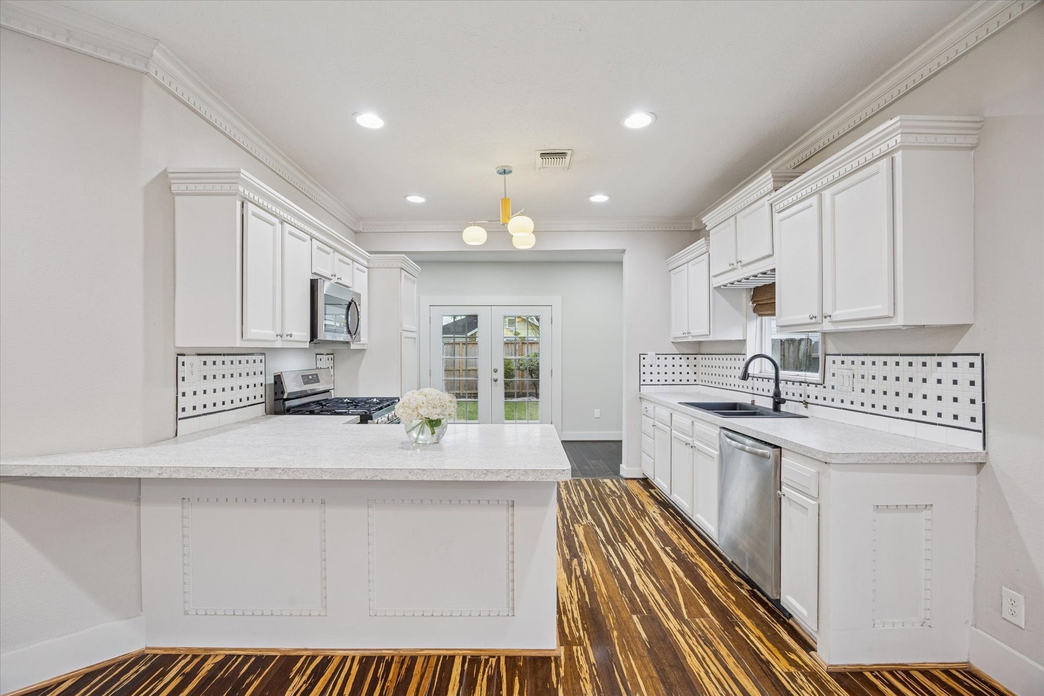 1124 Dunbar Street Houston, TX 77009 - Photo 6 of 21 Gorgeous kitchen with stainless steel appliances and significant storage space