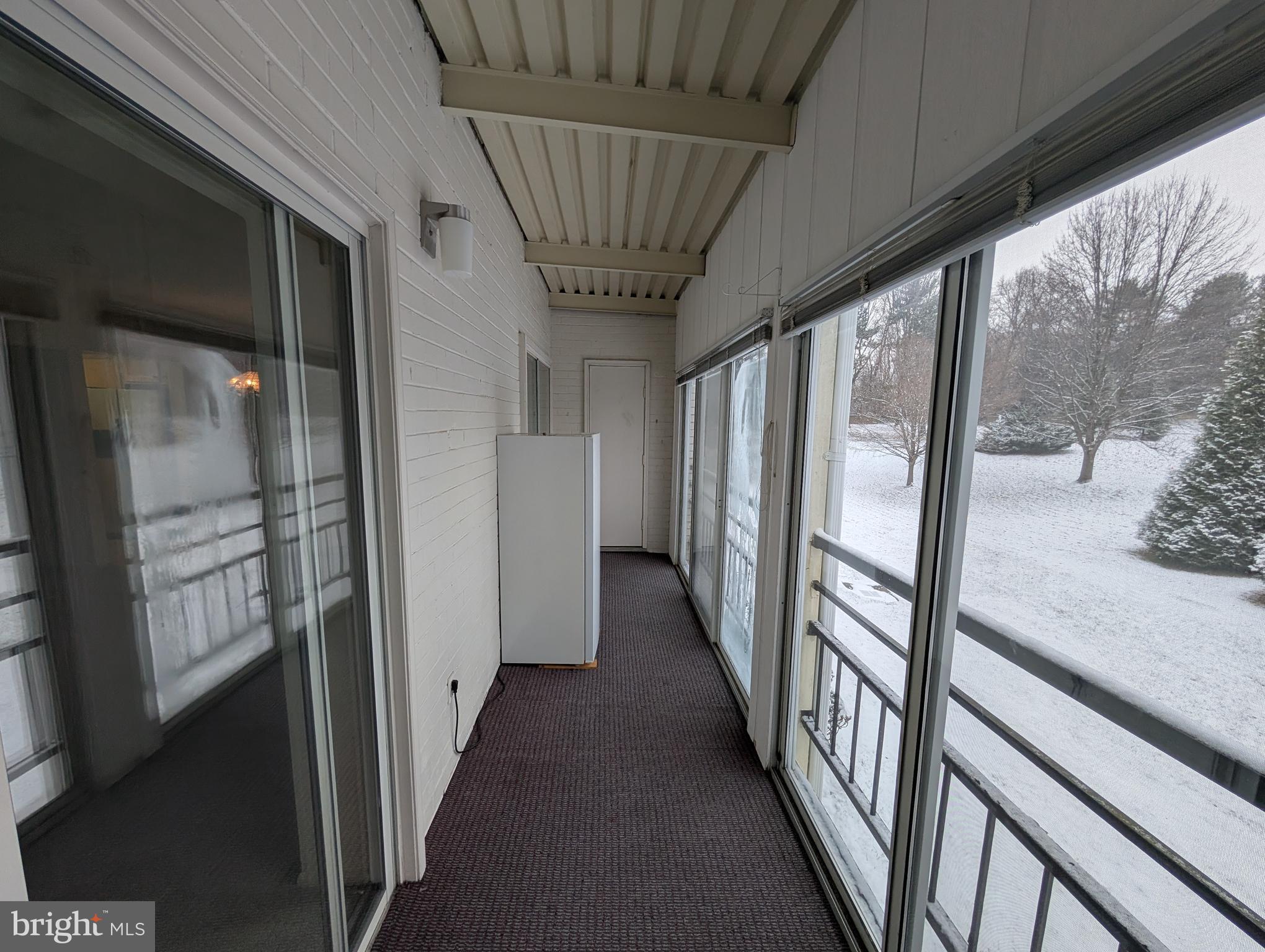 15401 Bassett Lane, Unit 452E Silver Spring, MD 20906 - Photo 25 of 26 a view of a hallway