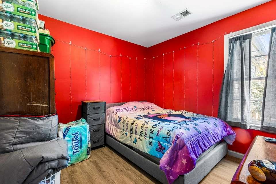 281 Northwinds Boulevard Carrollton, GA 30117 - Photo 11 of 15 a bedroom with a bed and a window