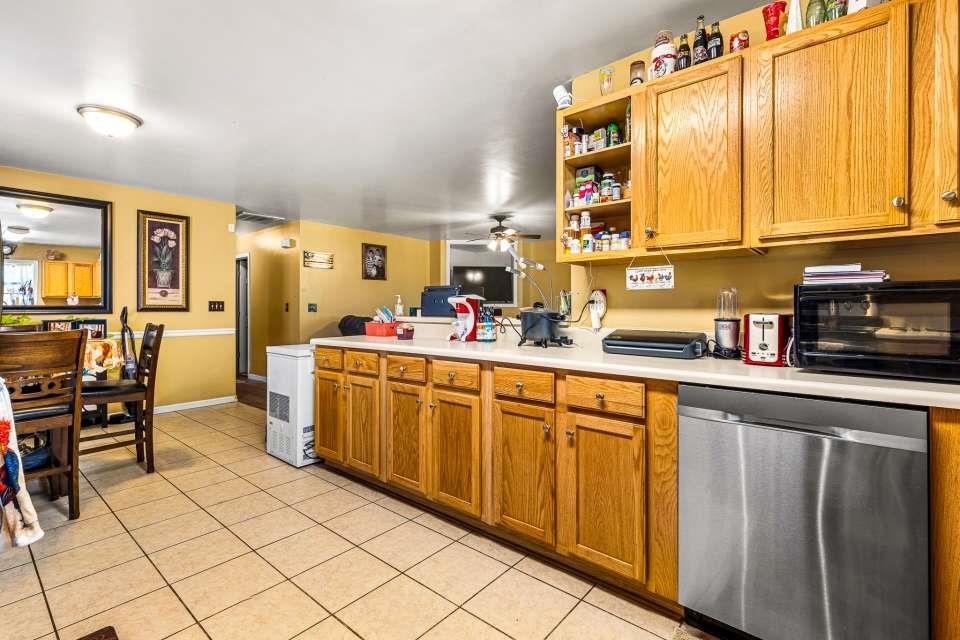 281 Northwinds Boulevard Carrollton, GA 30117 - Photo 6 of 15 a kitchen with stainless steel appliances a sink and cabinets
