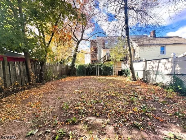 a house with trees in front of it