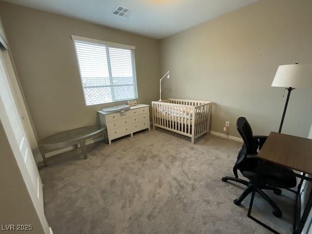 Undisclosed Address Henderson, NV 89011 - Photo 10 of 30 2nd floor 3rd bedroom with a desk and a crib