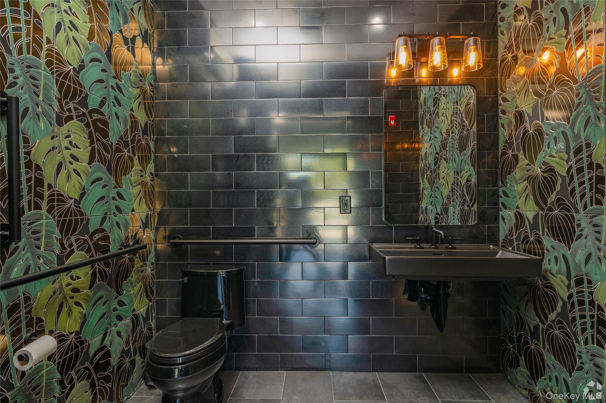 15 Washington Avenue, Unit 311 Suffern, NY 10901 - Photo 11 of 31 a bathroom with a toilet and a sink