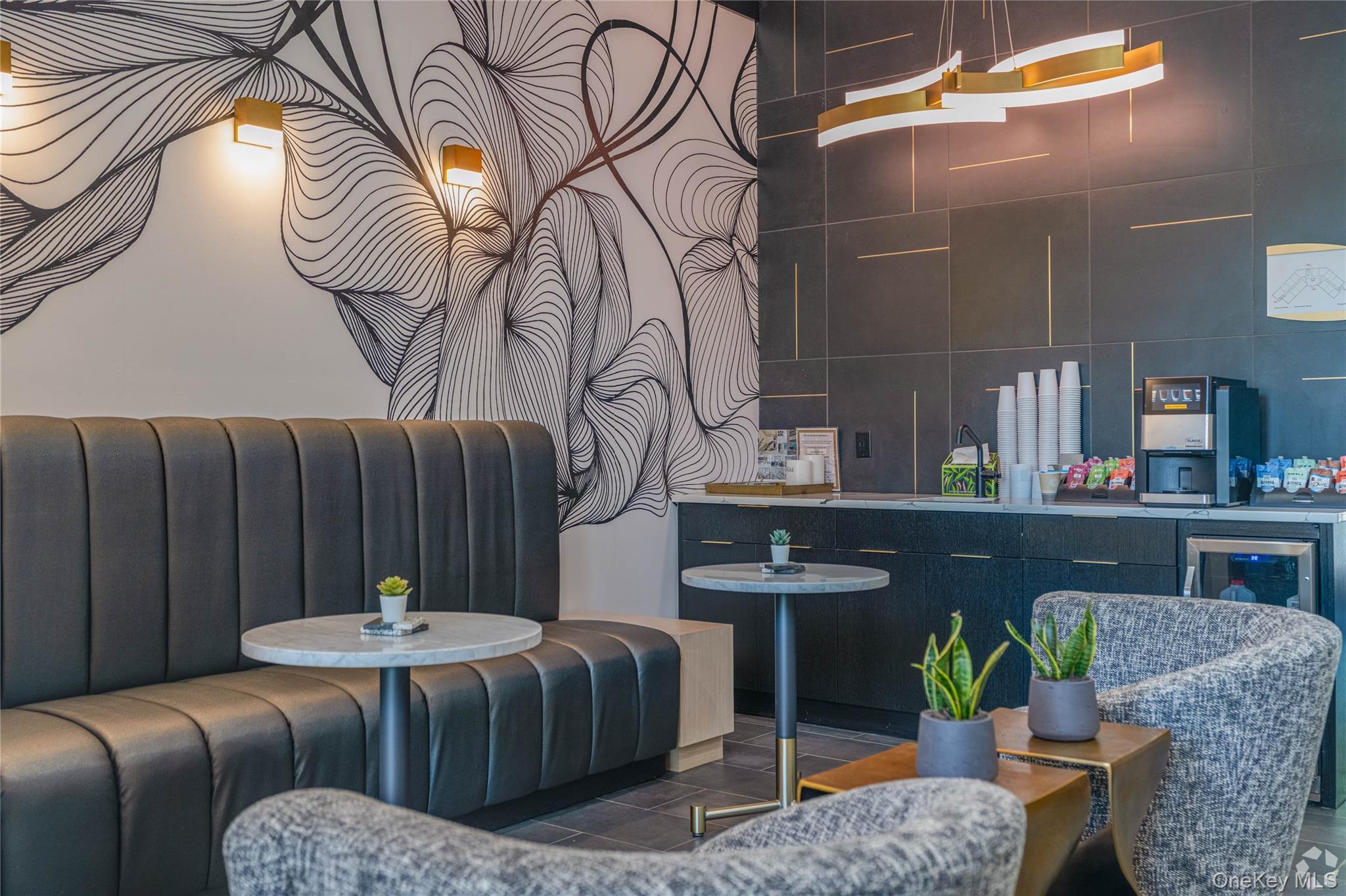 15 Washington Avenue, Unit 311 Suffern, NY 10901 - Photo 12 of 31 a living room with furniture and wooden floor