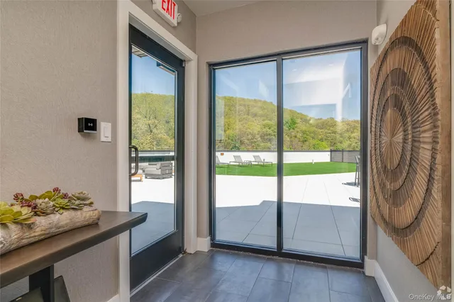 a view of a swimming pool with a patio