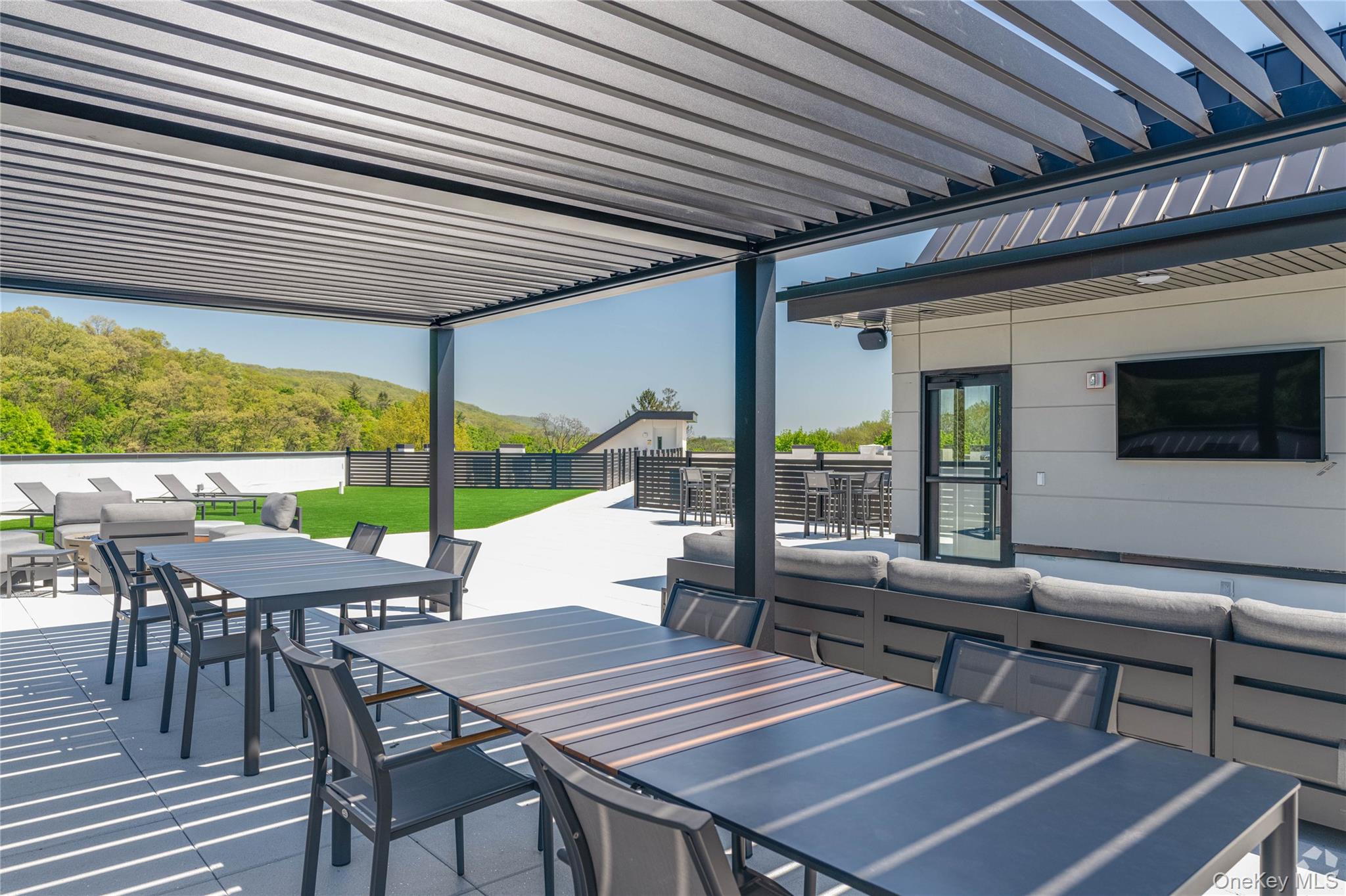 15 Washington Avenue, Unit 311 Suffern, NY 10901 - Photo 21 of 31 a outdoor space with chairs
