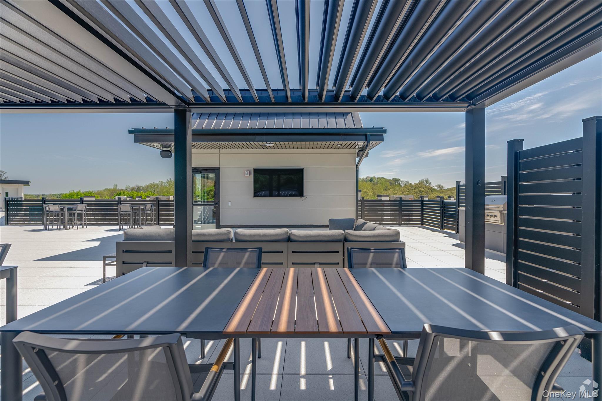 15 Washington Avenue, Unit 311 Suffern, NY 10901 - Photo 22 of 31 a outdoor view with a sitting space