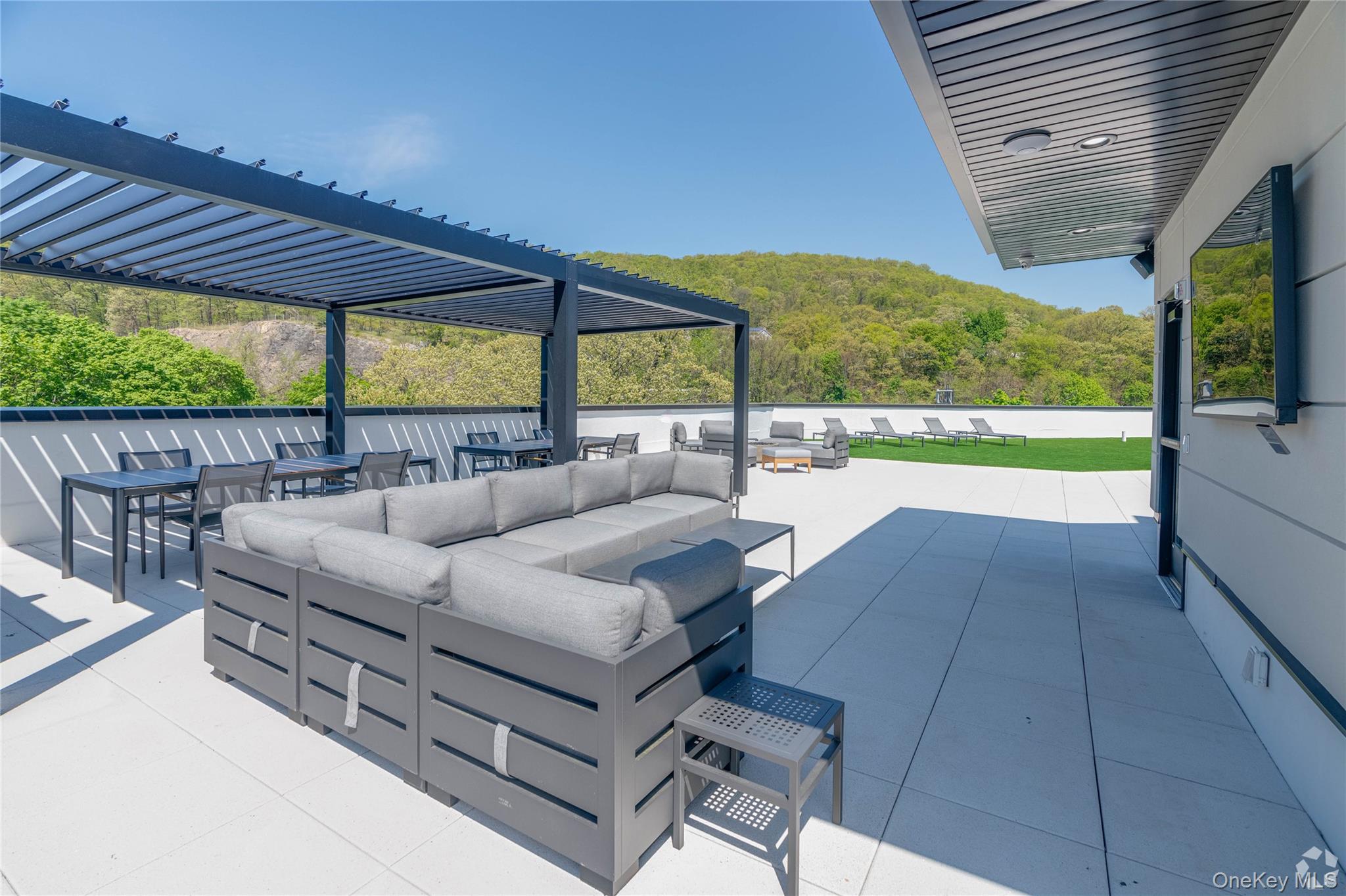 15 Washington Avenue, Unit 311 Suffern, NY 10901 - Photo 27 of 31 a outdoor view with a sitting space