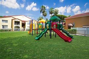 2113 Renaissance Boulevard, Unit 203 Miramar, FL 33025 - Photo 17 of 19 a view of a play ground