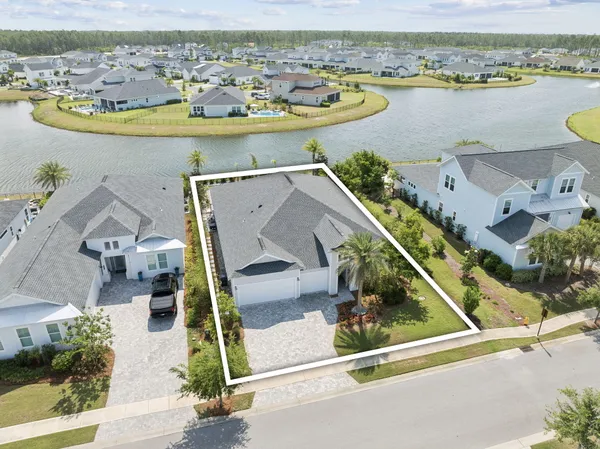an aerial view of a house with a outdoor space