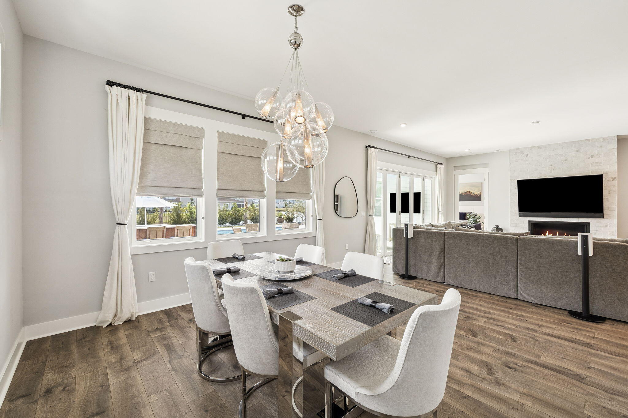 70 River Rise Way Inlet Beach Inlet Beach, FL 32461 - Photo 15 of 59 a view of a dining room with furniture window and wooden floor