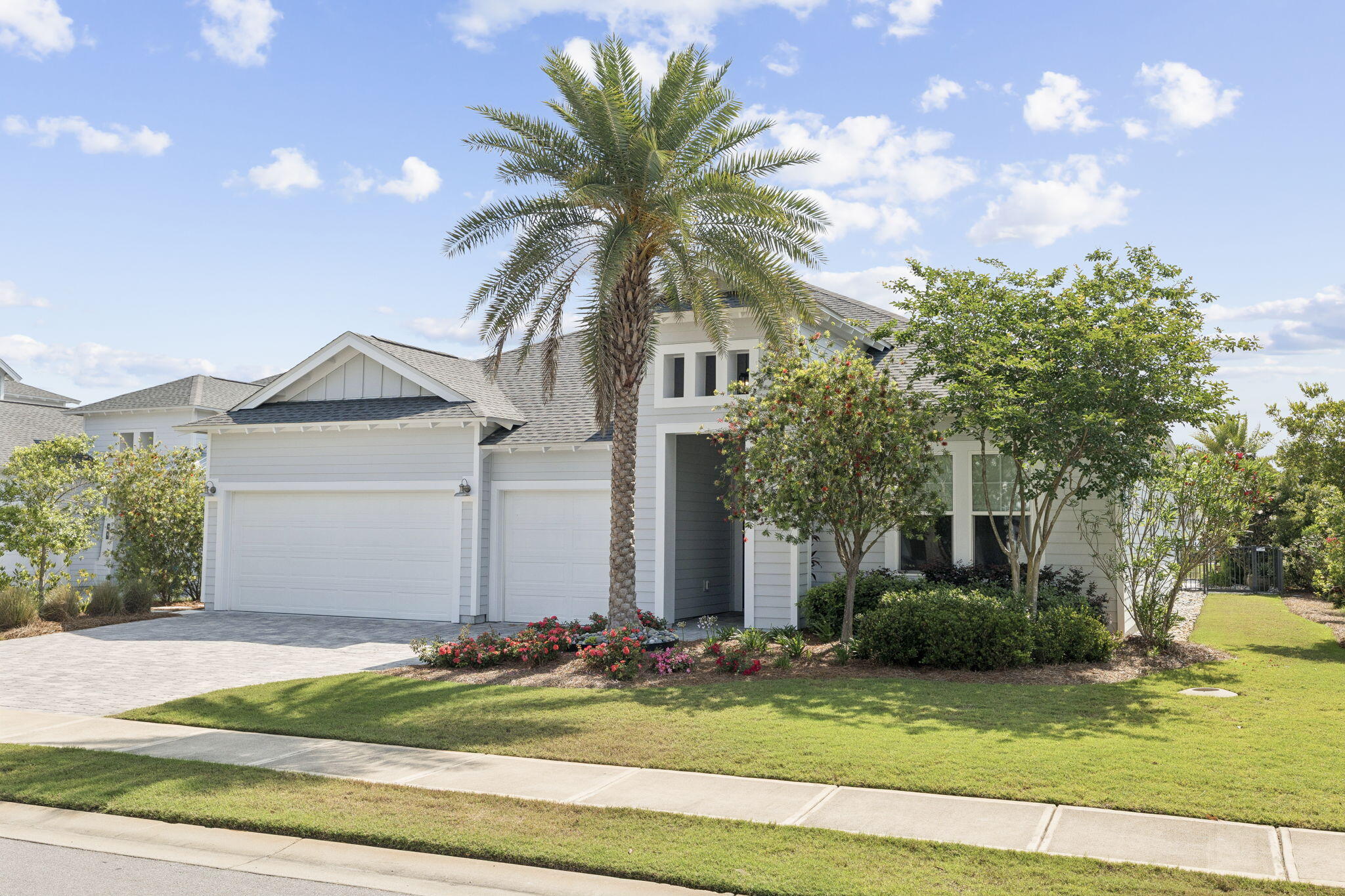 70 River Rise Way Inlet Beach Inlet Beach, FL 32461 - Photo 3 of 59 a front view of house with yard and trees around