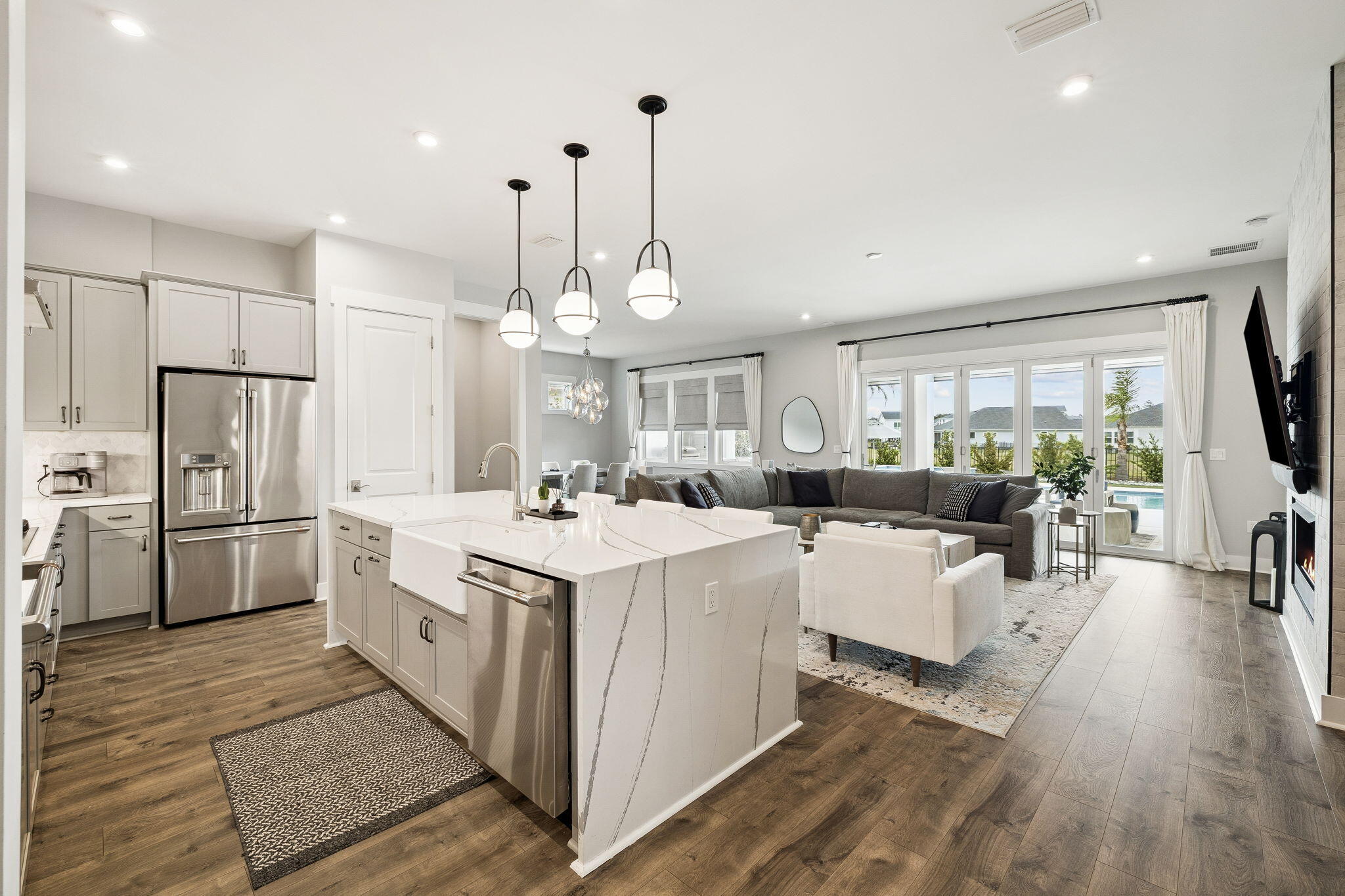 70 River Rise Way Inlet Beach Inlet Beach, FL 32461 - Photo 5 of 59 a large kitchen with kitchen island a large counter space a sink appliances and cabinets