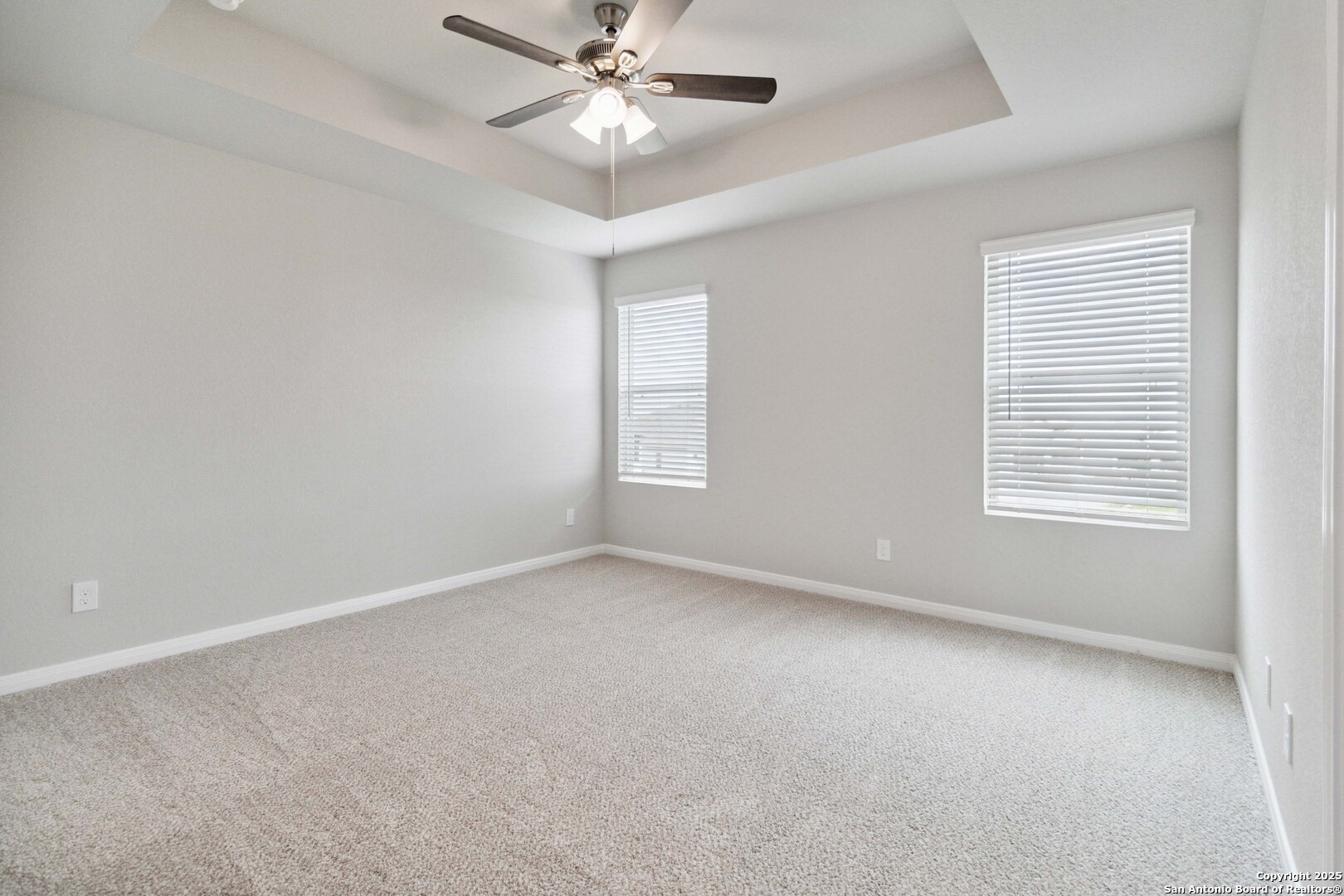 5406 Devils Gate Converse, TX 78109 - Photo 15 of 28 an empty room with a window and a fan
