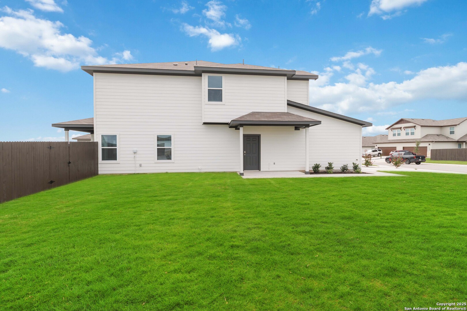 5406 Devils Gate Converse, TX 78109 - Photo 24 of 28 a front view of house with yard and green space