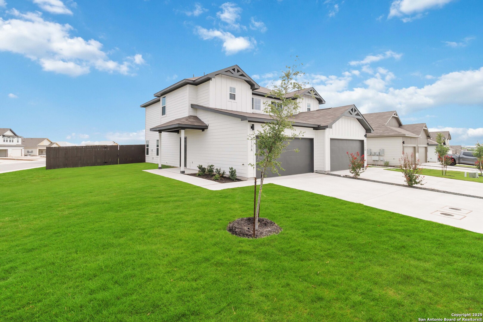 5406 Devils Gate Converse, TX 78109 - Photo 3 of 28 a house with green field in front of it