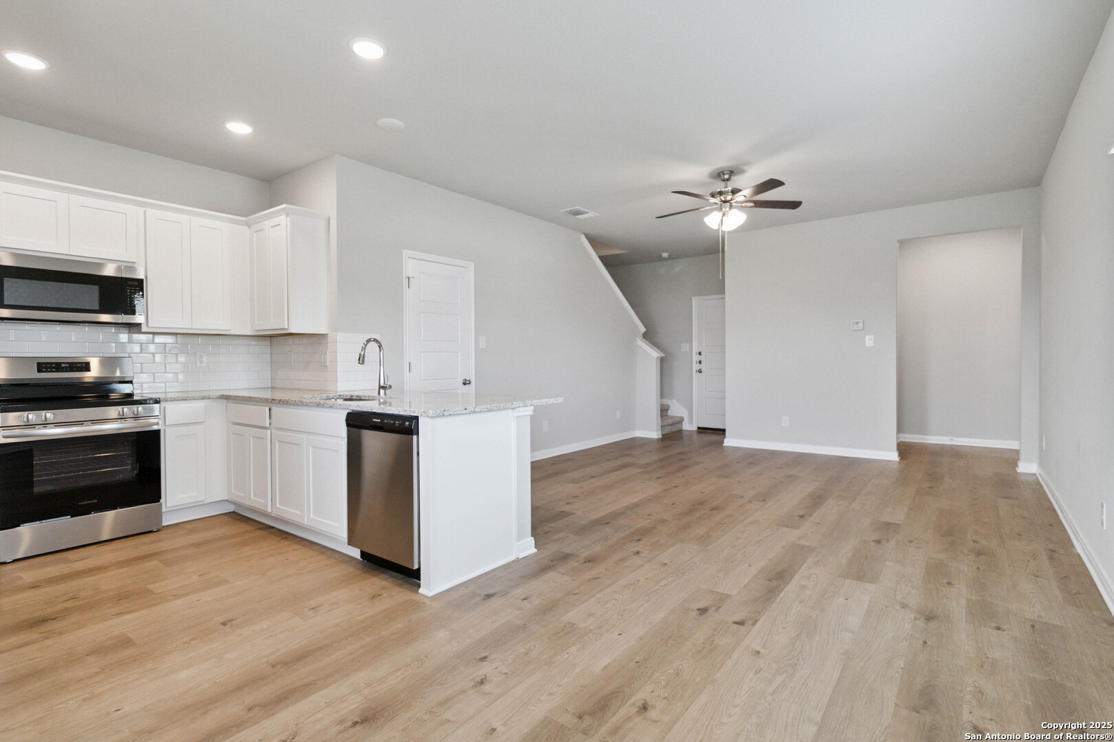 5406 Devils Gate Converse, TX 78109 - Photo 5 of 28 a view of kitchen with sink and wooden floor
